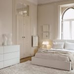 Dormitorio beige y blanco