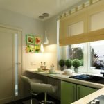 Cocina en tonos verdes y beige.