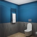 Azul y gris en el acabado del baño.