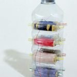 Botella de plástico para almacenar hilos