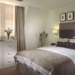 Dormitorio blanco textil marrón