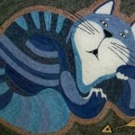 Gato y esqueleto de pez