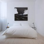 Ropa de cama blanca en una cama doble