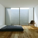 Dormitorio con piso laminado