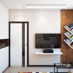 Estanterías en la pared al lado del televisor
