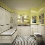 Azulejos blancos y negros en el piso del baño