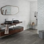 Baño con dos lavabos.