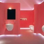 Color rojo en el diseño del baño.