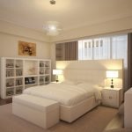 Dormitorio con cama beige