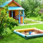 Parque infantil con arenero