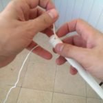 Pegar la cuerda en el tubo