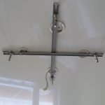 Fijación de un candelabro a un techo tensado