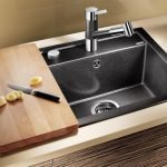 Lavabo con tabla de cortar