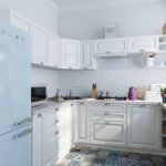 La combinación de muebles blancos y un refrigerador azul.