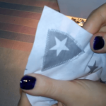 Coser una oreja