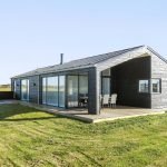 Casa con ventanas panorámicas