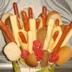 Inserte los pinchos en la espuma.